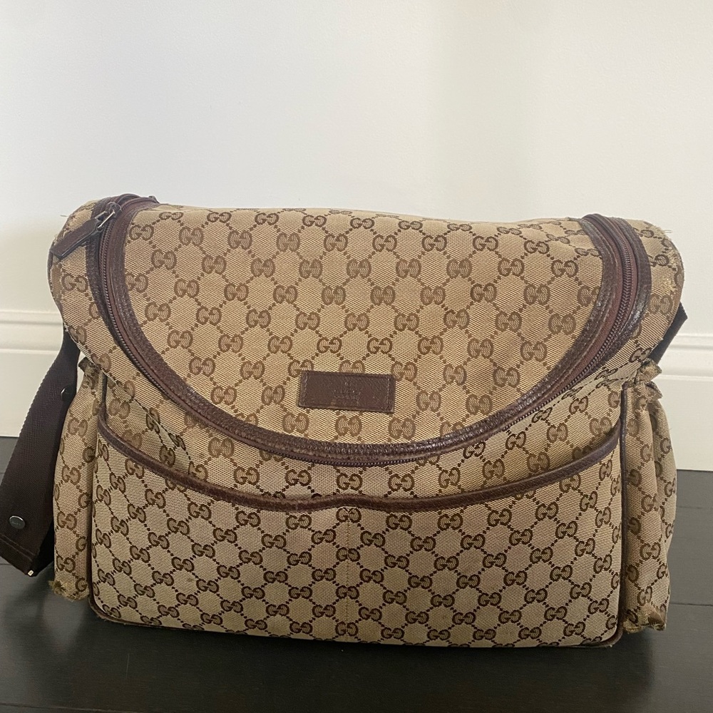 Gucci diaper bag with gucci changing mat